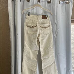 Levi’s Women's Cream High-Rise Jeans - Classic Back Pocket Detail